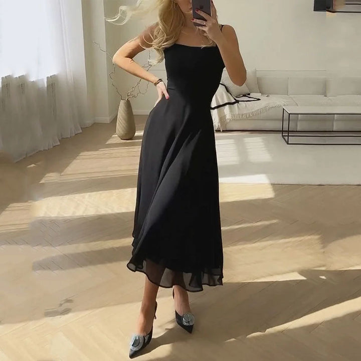 VIOLA KLEID – ELEGANTES TRÄGERKLEID MIT WEITEM ROCKSAUM