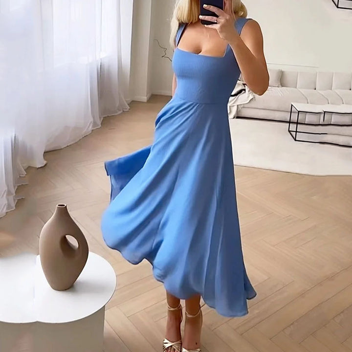 VIOLA KLEID – ELEGANTES TRÄGERKLEID MIT WEITEM ROCKSAUM