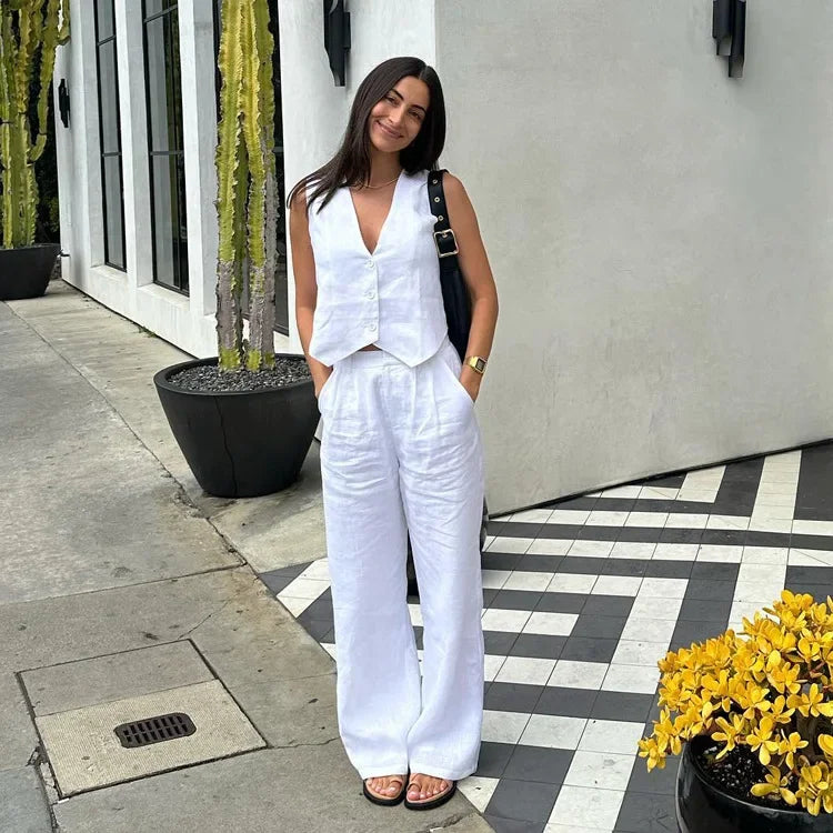 LEONTINA EINTEILER – ÄRMELLOSER JUMPSUIT MIT TIEFEM V-AUSSCHNITT