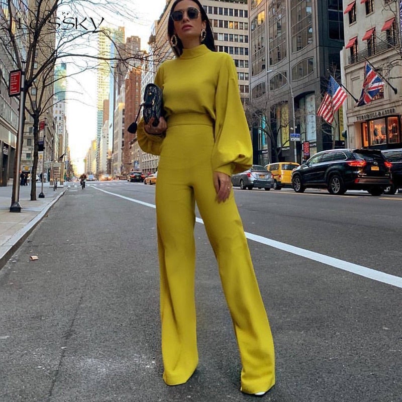 https://cdn.shopify.com/s/files/1/0862/3203/9760/files/reine-farbe-halber-kragen-jumpsuits-869433_118abc96-a8b8-4f00-b18c-ec41fcad7180.jpg?v=1728507072