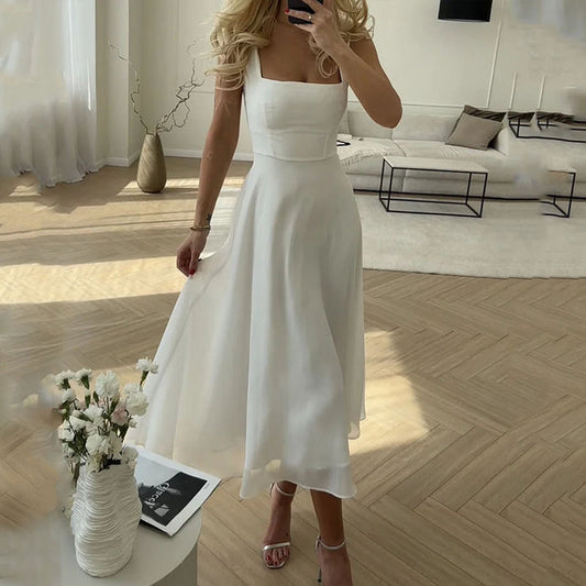 VIOLA KLEID – ELEGANTES TRÄGERKLEID MIT WEITEM ROCKSAUM