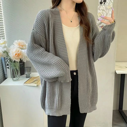 KUSHIRO STRICKJACKE OVERSIZE AUS RIPPSTRICK MIT TASCHEN