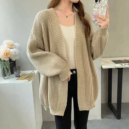 KUSHIRO STRICKJACKE OVERSIZE AUS RIPPSTRICK MIT TASCHEN