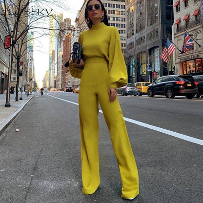 https://cdn.shopify.com/s/files/1/0862/3203/9760/files/reine-farbe-halber-kragen-jumpsuits-869433_118abc96-a8b8-4f00-b18c-ec41fcad7180.jpg?v=1728507072